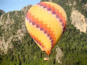 floating by the mountain in vang vieng